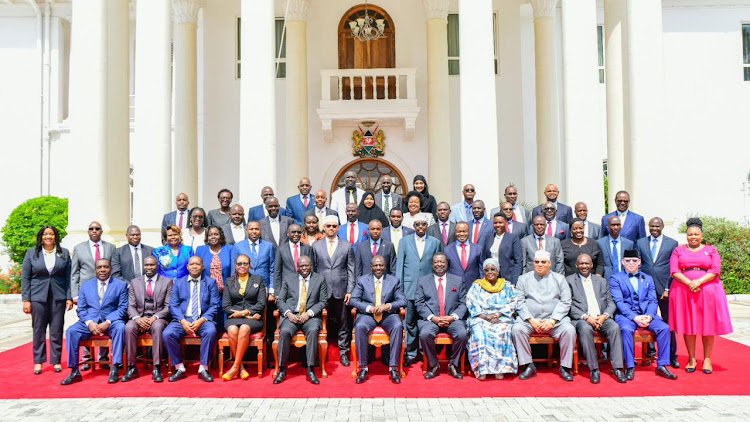 President William Ruto with the 50 CASs who were sworn into office.